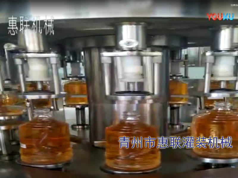 全自動食用油灌裝設(shè)備 全自動食用油灌裝設(shè)備